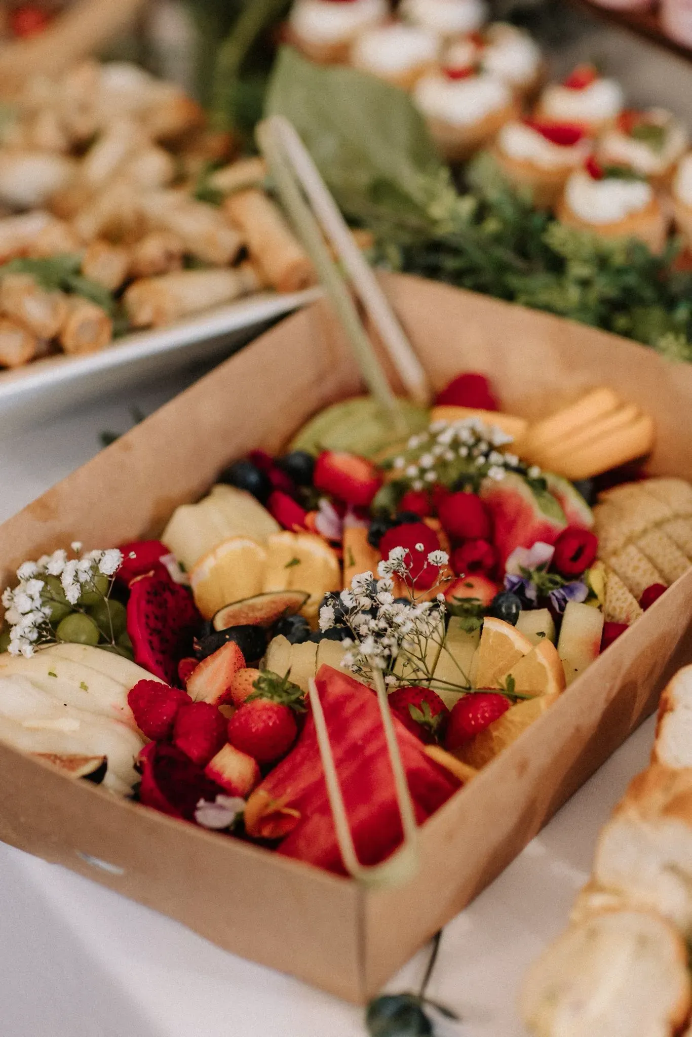 Overview of a full catering setup with various dishes on a buffet table